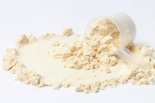 Preview: Protein and measuring spoon on white background, concert of sports nutrition.