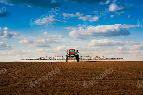 Preview: self-propelled sprayer that fertilizes fields, beautiful clouds