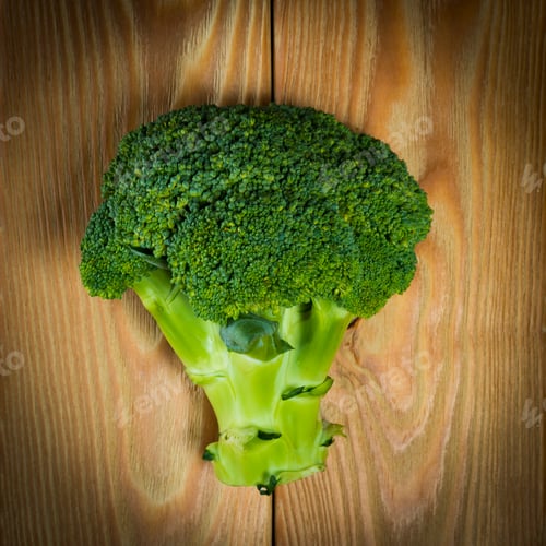 Fresh Green Broccoli on a Wooden Table