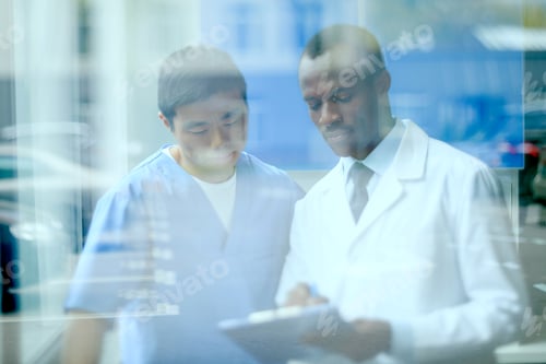Preview: portrait of doctors discussing work, doctor conference concept