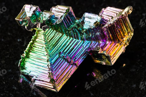 Preview: raw grown bismuth crystals mineral on black