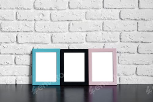 Preview: Photo frame with copy space against white brick wall