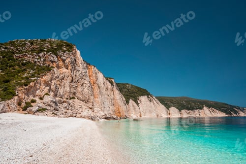 Preview: Fteri beach in Kefalonia Island, Greece. One of the most beautiful untouched pebble beach with pure