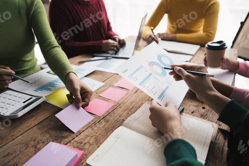 Preview: Business team colleagues meeting Planning Strategy Analysis discussing new plan financial graph data