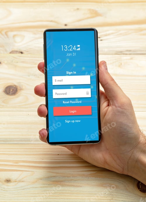 Preview: Man holding a smartphone with Login, password on the screen, wooden background