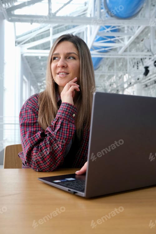 Preview: A young female freelancer is working. Remote work. Freelance.