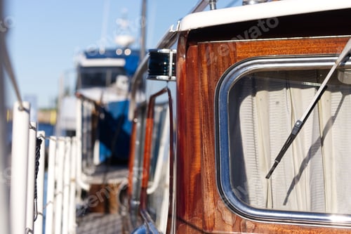 Preview: Old classic retro beautiful yacht docking at the port. Seen from the front close up view.