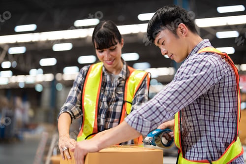 Preview: 2 staff worker working in the large depot storage warehouse