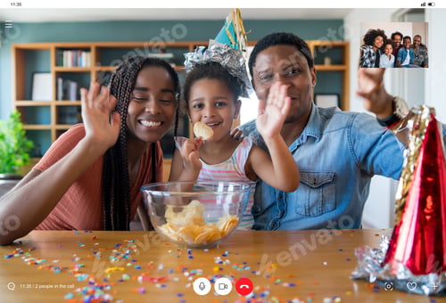 Preview: Family celebrating birthday on a video call.