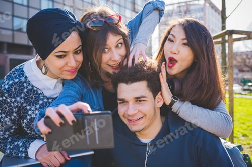 Preview: Multiracial group young people taking selfie