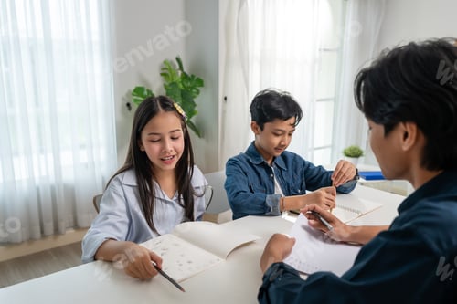Preview: Asian students learning with teacher in classroom at elementary school.