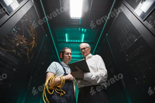 Preview: Two People in Server Room Low Angle