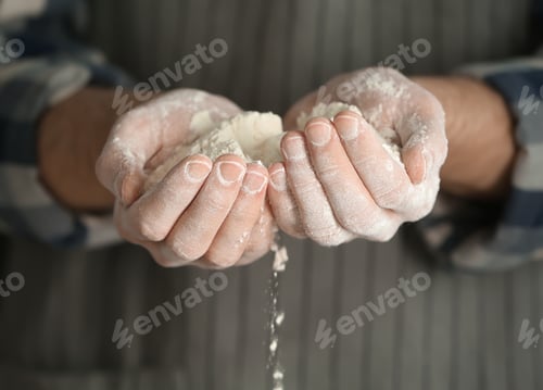 Preview: Man holding flour, closeup