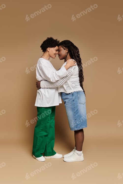 Preview: Stylish lesbian couple embracing each other in a vibrant setting with love and fashion