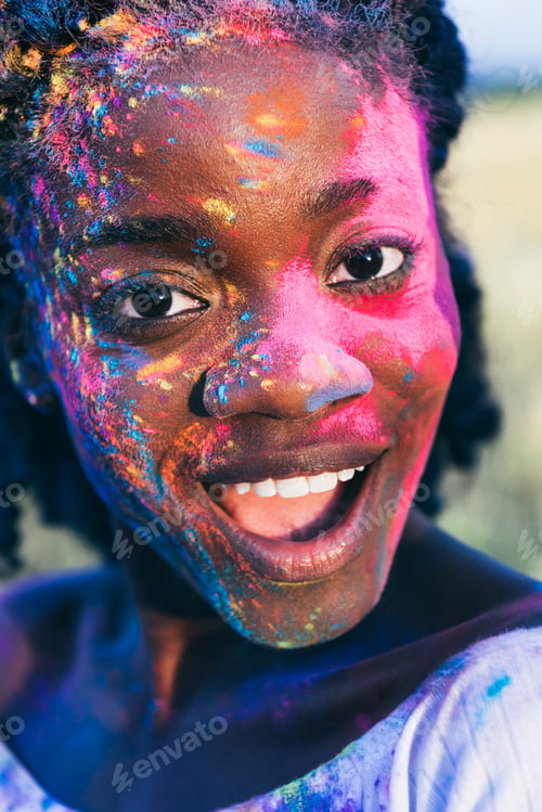 Preview: African American Girl With Colorful Paint on Face