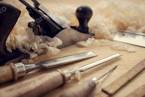 Preview: Carpentry tools and wood shavings on table