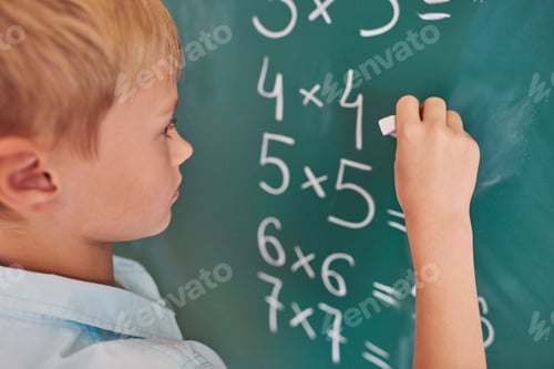 Preview: Boy doing some mathematical exercises