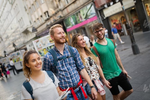 Preview: Tourist friends discovering city on foot