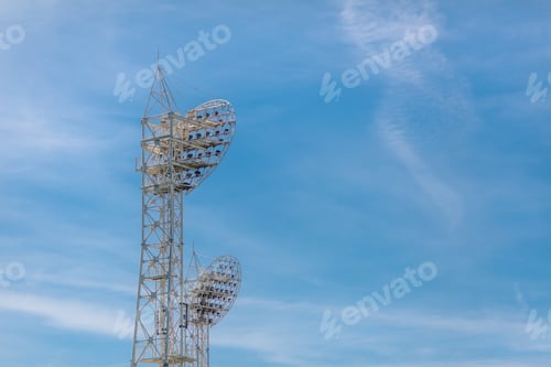 Preview: Stadium light against blue sky. Sports architecture and equipment