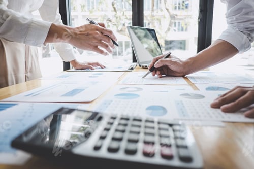 Preview: Business casual team manager having a discussion with new project success financial statistics