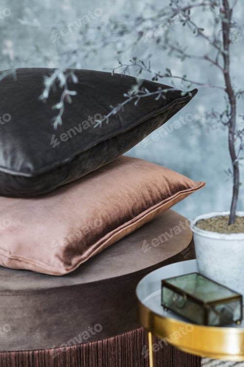 Preview: Stylish composition of cozy living room interior details and colourful classy velur pillows.
