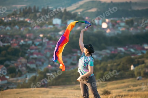 Preview: Young woman with LGBT flag.