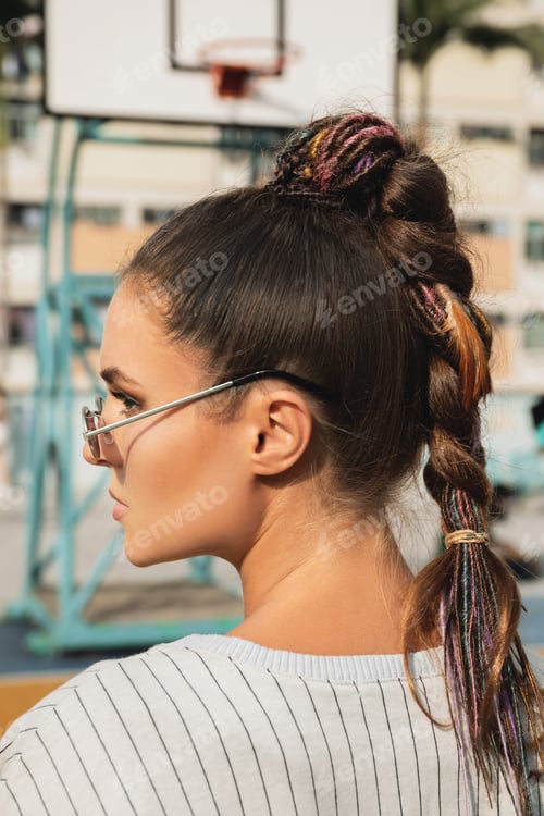 Preview: Stylish Woman with Braided Hair and Glasses