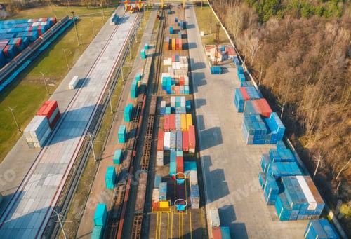 Preview: Aerial view of container loading and unloading at sunset