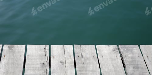 Preview: Wooden boardwalk with blue sea