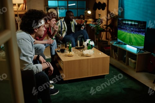 Preview: Young People Watching Soccer On TV