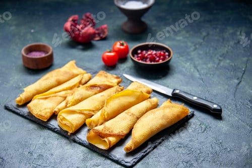 Preview: front view rolled pancakes lined with tomatoes on dark background dough hotcake color meal pie meat