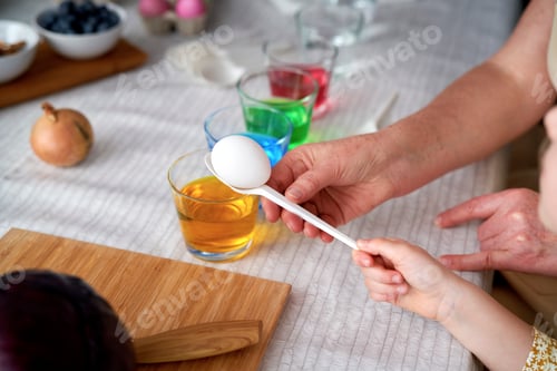 Preview: Close up of dyeing Easter eggs