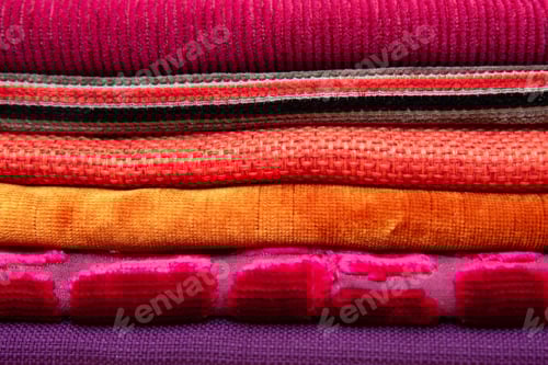 Preview: Colorful Stack of Fabric Texture in Close-up