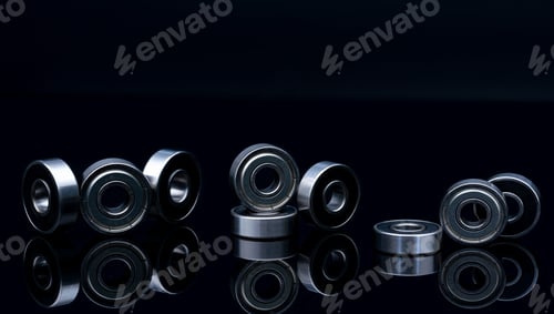 Preview: Stainless steel ball bearing on blackk background. Set of thrust ball bearing and silver ball bear