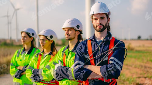 Preview: Professional engineer technician working outdoor at wind turbine field