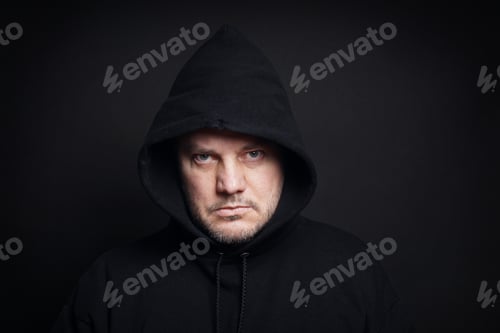 Preview: bearded middle-aged man wearing black hoodie