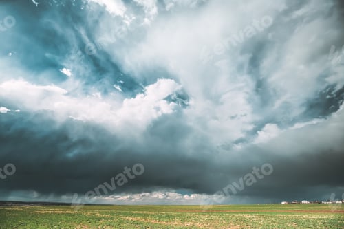 Preview: Countryside Rural Field Spring Meadow During Rain. Rain Clouds On Horizon. Agricultural And Weather