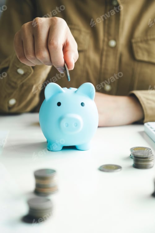 Preview: Saving Money in Blue Piggy Bank Indoors