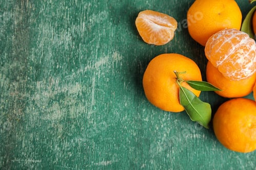 Preview: Fresh ripe tangerines and space for text on wooden background