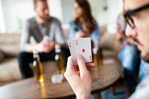 Preview: Two aces playing cards in male player hands