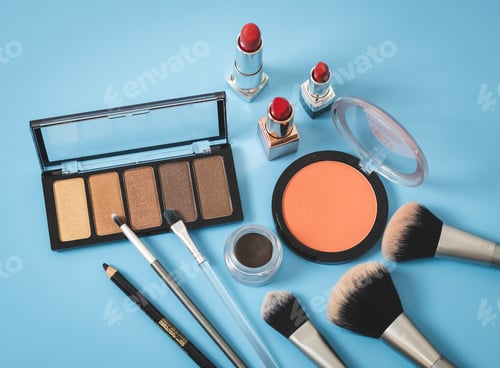 Preview: A set of female cosmetics on a blue background.