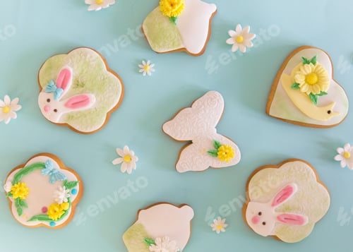 Preview: Easter cookies and meringue on a pastel background. Easter greeting card concept