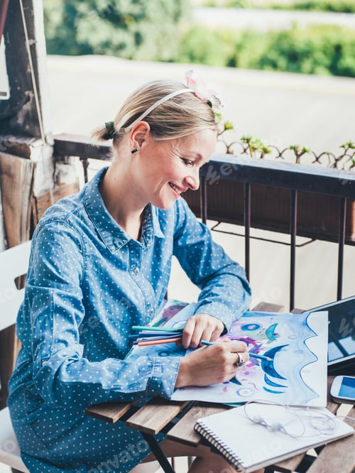 Preview: Young beautiful eastern woman painter drawing