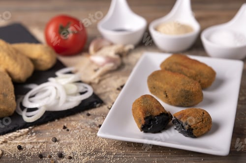 Preview: Plate with squid ink croquettes and sauces