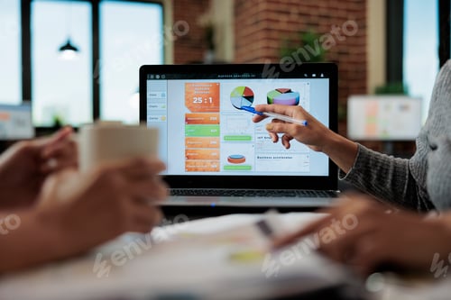 Preview: Close up of entrepreneur women analyzing marketing graphs