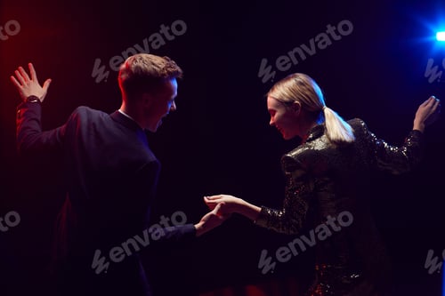 Preview: Young Couple Dancing at Party