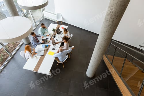 Preview: Top view at business people working in office