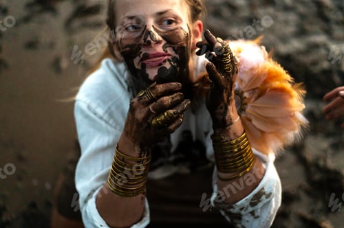 Preview: Funny woman with dirty black hands with luxury jewelry near the face, joyful emotions