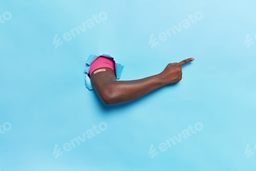 Preview: Arm Through Torn Paper with Bandage, Pointing