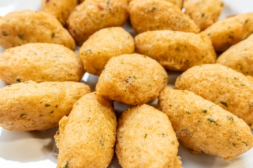 Preview: traditional appetizer of the portuguese gastronomy made with codfish, bolinhos de bacalhau